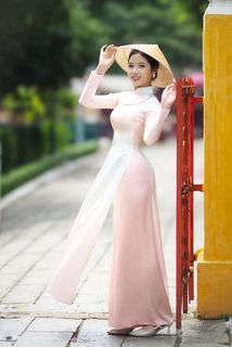 Capturing the Timeless Elegance of Vietnamese Women: A Journey Through Traditional Ao Dai Fashion and Faded Pink Hues-7