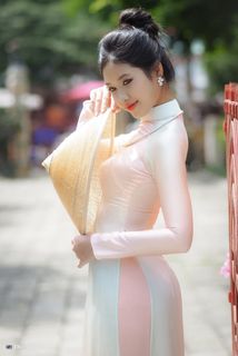 Capturing the Timeless Elegance of Vietnamese Women: A Journey Through Traditional Ao Dai Fashion and Faded Pink Hues-11