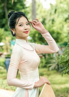 Capturing the Timeless Elegance of Vietnamese Women: A Journey Through Traditional Ao Dai Fashion and Faded Pink Hues-6