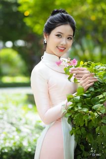 Capturing the Timeless Elegance of Vietnamese Women: A Journey Through Traditional Ao Dai Fashion and Faded Pink Hues-16