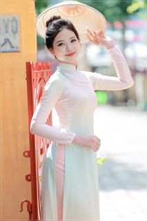 Capturing the Timeless Elegance of Vietnamese Women: A Journey Through Traditional Ao Dai Fashion and Faded Pink Hues-2
