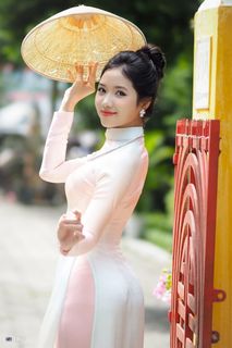 Capturing the Timeless Elegance of Vietnamese Women: A Journey Through Traditional Ao Dai Fashion and Faded Pink Hues-15
