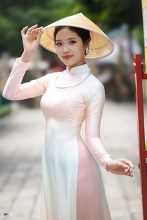Capturing the Timeless Elegance of Vietnamese Women: A Journey Through Traditional Ao Dai Fashion and Faded Pink Hues-14
