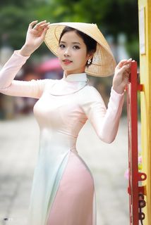 Capturing the Timeless Elegance of Vietnamese Women: A Journey Through Traditional Ao Dai Fashion and Faded Pink Hues-29