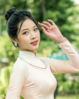 Capturing the Timeless Elegance of Vietnamese Women: A Journey Through Traditional Ao Dai Fashion and Faded Pink Hues-9