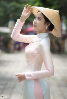 Capturing the Timeless Elegance of Vietnamese Women: A Journey Through Traditional Ao Dai Fashion and Faded Pink Hues-13