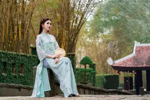 Graceful Ao Dai Girl Amidst Bamboo: Timeless Beauty and Serenity-3