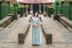 Graceful Ao Dai Girl Amidst Bamboo: Timeless Beauty and Serenity-4