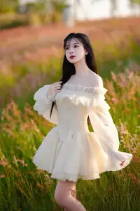 Golden Hour Dream: Ethereal Beauty in White Amidst a Blooming Field-5