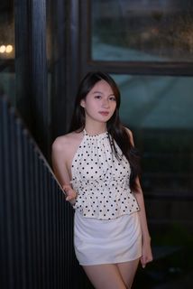 Elegant Beauty of a Young Vietnamese Girl in a Cafe Setting-6