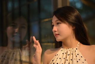 Elegant Beauty of a Young Vietnamese Girl in a Cafe Setting-4