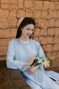 Serene Beauty: Graceful Young Woman in Traditional Attire with White Lilies-0