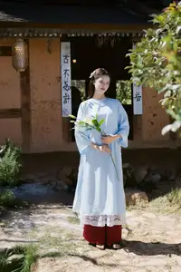 Serene Beauty: Graceful Young Woman in Traditional Attire with White Lilies-7