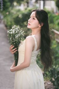 Graceful Girl in Light Yellow Dress with White Flowers, Ethereal Beauty in Nature-5