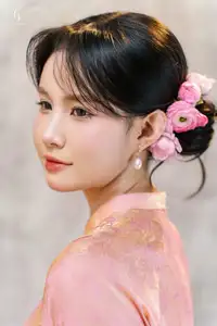 Elegant Asian Charm: Serene Young Woman in Traditional Pink Attire with Delicate Fresh Flowers-8