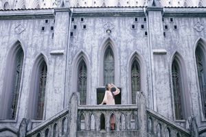 Elegant Woman in Pink Ao Dai at Hanoi Grand Cathedral - Vietnamese Cultural Charm-10