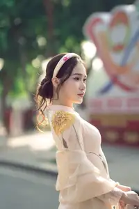 Graceful Vietnamese Beauty: Captivating Charm of a Girl in Elegant Traditional Attire-0