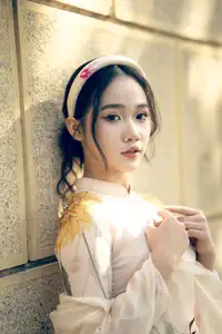 Graceful Vietnamese Beauty: Captivating Charm of a Girl in Elegant Traditional Attire-5