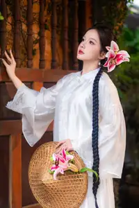 Captivating Asian Beauty: Discover the Ethereal Charm of a Maiden in White with a Blossom in Her Hair.-2