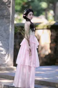 Discover the gentle charm of an Asian beauty in elegant attire, exuding grace and allure 1000025175-9