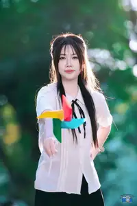 Radiant Youth: Vietnamese Girl's Bright Smile with Pinwheel in Golden Sunlight-2