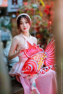 Elegant Vietnamese Beauty with Traditional Fish Lantern, Celebrating Culture-4