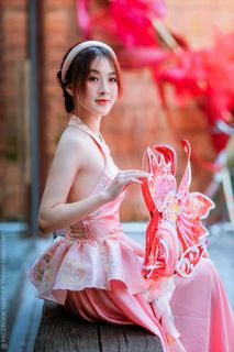 Elegant Vietnamese Beauty with Traditional Fish Lantern, Celebrating Culture-0