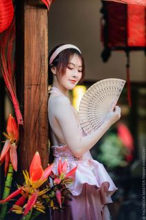 Elegant Vietnamese Beauty with Traditional Fish Lantern, Celebrating Culture-9