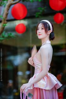 Elegant Vietnamese Beauty with Traditional Fish Lantern, Celebrating Culture-3