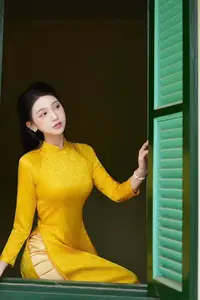 Graceful Vietnamese Beauty in Elegant Yellow Ao Dai-4