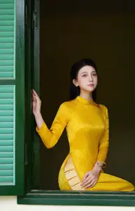 Graceful Vietnamese Beauty in Elegant Yellow Ao Dai-2
