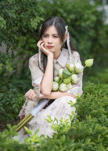 Elegant Vietnamese Woman with Pure Lotus Flowers-5