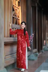 Elegant Red Ao Dai: Vietnamese Beauty with Cherry Blossoms in Ancient Architecture-1