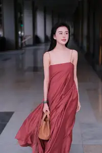 Stunning Maxi Dress Style: A Beautiful Woman's Elegant Pose.-2