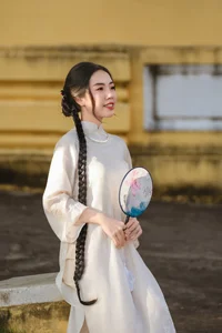 Elegant White Modern Ao Dai: A Timeless Vietnamese Tradition for Minimalist Street Style and Cultural Travel Inspiration-0