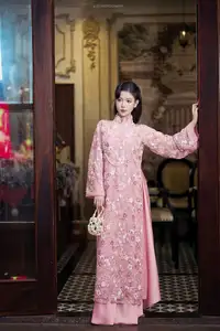 Graceful Pink Ao Dai Beauty: Elegant Vietnamese Woman with Alluring Pearl Jewelry-10