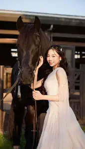Elegant Beauty: Graceful Girl with a Majestic Black Horse-0
