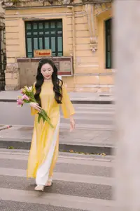 Graceful Vietnamese Beauty: Elegant Woman in Modern Traditional Attire Captures Asian Charm-1