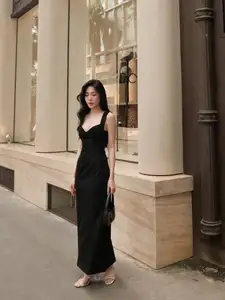Elegant Black Dress: Modern Muse Captivating All Eyes on the Street-0