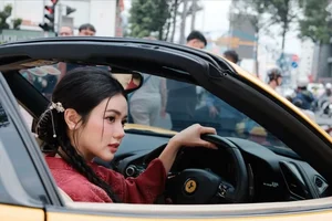 Stunning Red Ao Dai Fashion: TikTok Influencer Bo Chanh Poses with a Luxury Yellow Supercar in Elegant Traditional Vietnamese Style-1