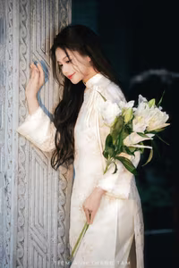 VGU No.131: Explore the Ethereal Beauty of a Vietnamese Lady in White Ao Dai with Lilies-19