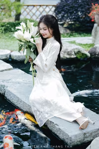 VGU No.131: Explore the Ethereal Beauty of a Vietnamese Lady in White Ao Dai with Lilies-14
