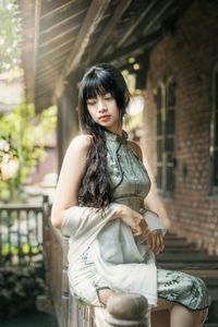 Elegant Vietnamese Girl on Ancient Wooden Bridge-7