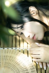 Elegant Vietnamese Girl on Ancient Wooden Bridge-0