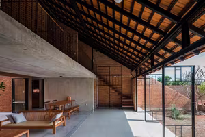 Astonishing architecture of the sloped roof house in Long An resembling a brick kiln hiding unique interior spaces-6