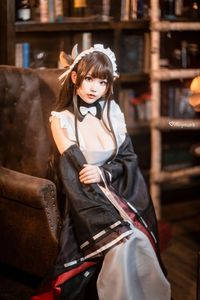 Coser Qiqi Nanako: Adorable Cow Maid Cosplay Captivates Fans-9