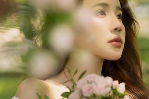 Gentle Beauty: Girl in Pristine White Dress with Pink Rose Bouquet Amidst Nature, Elegant Summer Style 1000019683-0