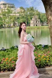 XVG No.24: Discover the Graceful Beauty of a Young Woman in Pink by Hoan Kiem Lake-3
