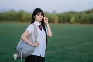 Youthful Schoolgirl in Uniform: Serene Golden Hour Beauty, a Glimpse into Nostalgic Student Life.-3