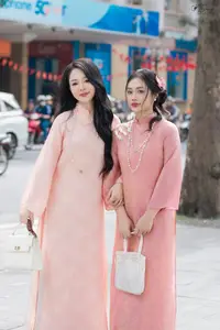 Discover the Elegant Charm of Vietnamese Beauty in a Pink Ao Dai by the Serene Lake-2